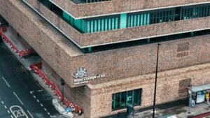 Aerial view of the Royal College of Art Studio Building in London showcasing modern brick architecture.